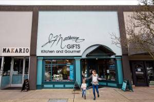 Customers leave J. Matheson Gifts Wednesday, Feb. 16, 2022, in Everett, Washington. (Ryan Berry / The Herald)