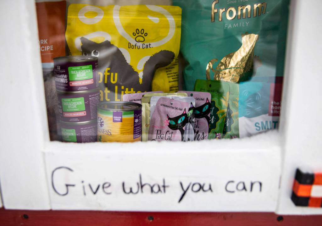 A variety of food, treats and toys available in the 24-hour pet food pantry on Dec. 20, 2022 in Mill Creek. (Olivia Vanni / The Herald)