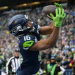 Seattle Seahawks wide receiver Tyler Lockett (16) makes a touchdown catch in the end zone against the Carolina Panthers during the first half of an NFL football game, Sunday, Dec. 11, 2022, in Seattle. (AP Photo/Caean Couto)