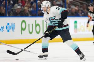 Seattle Kraken right wing Oliver Bjorkstrand (22) against the Tampa Bay Lightning during the first period of an NHL hockey game Tuesday, Dec. 13, 2022, in Tampa, Fla. (AP Photo/Chris O'Meara)