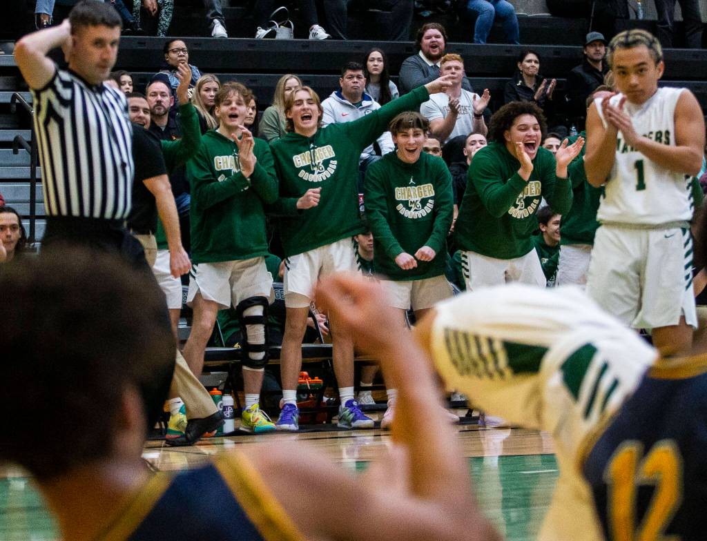 The Marysville Getchell bench reacts to a foul call during the game against Shorecrest on Friday, Dec. 16, 2022 in Maryville, Washington. (Olivia Vanni / The Herald)
