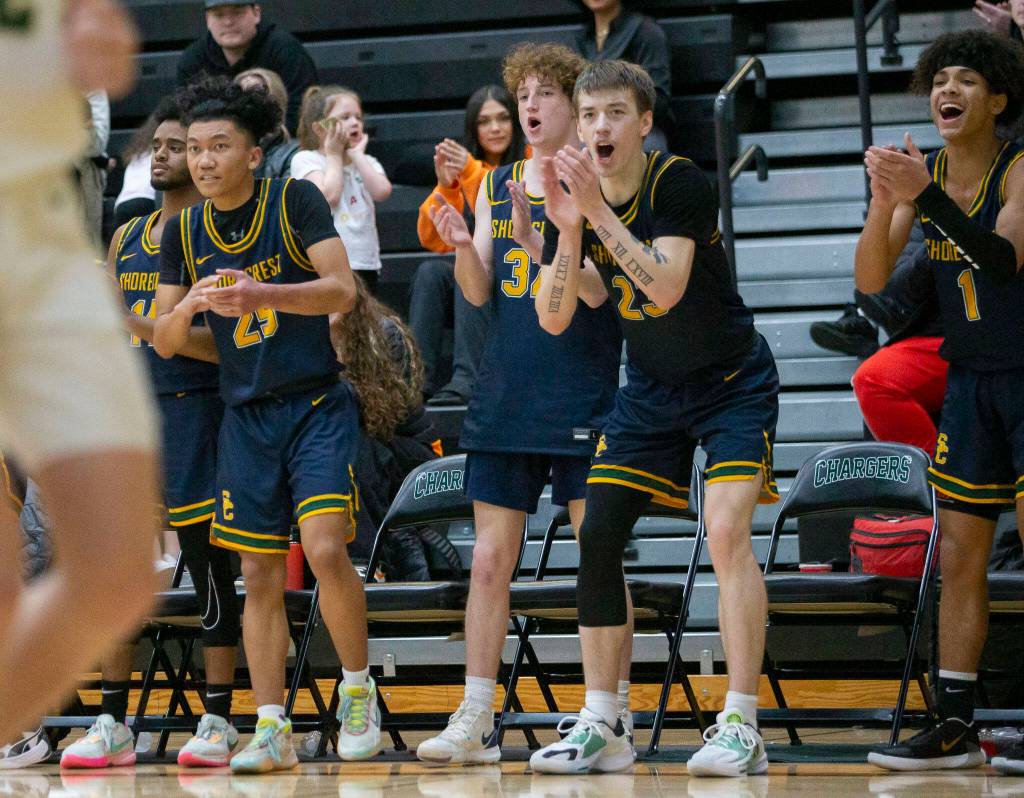 The Shorecrest bench reacts to a shot during the game against Marysville Getchell on Friday, Dec. 16, 2022 in Marysville, Washington. (Olivia Vanni / The Herald)