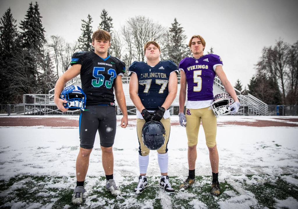 The Heralds All-Area first-team defense defensive line group, from left to right: Shorewood senior Hunter Tibodeau, Arlington senior Wyatt Tilton, Lake Stevens senior Cole Becker. Not pictured: Marysville Pilchuck senior Christian Van Natta. (Olivia Vanni / The Herald)