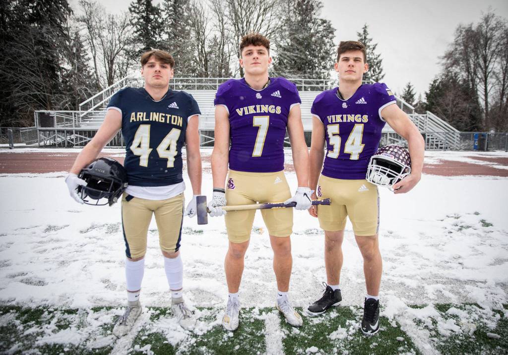 The Heralds All-Area first-team defense linebackers group, from left to right: Arlington senior Spencer Fischer, Lake Stevens junior Mason Turner, Lake Stevens senior Joe McGinnis. Not pictured: Monroe junior Biggie Notoa. (Olivia Vanni / The Herald)