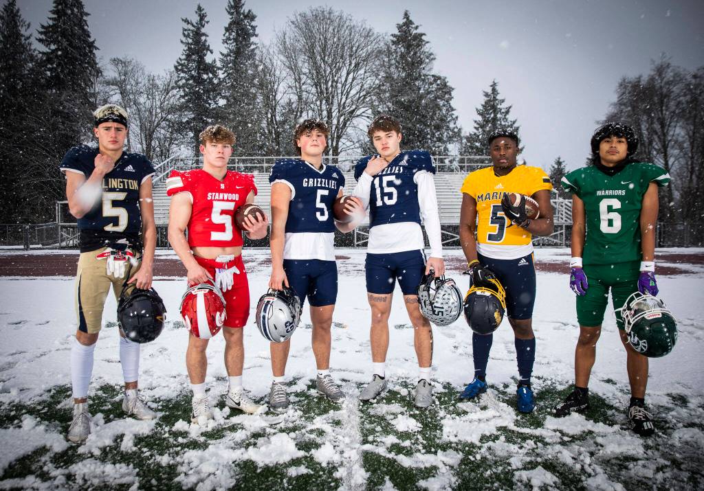The Heralds All-Area first-team offense skill position group, from left to right: Arlington junior Jacoby Falor (all-purpose), Stanwood senior Ryder Bumgarner (RB), Glacier Peak senior River Lien (QB), Glacier Peak senior Trey Leckner (WR), Mariner Senior Cartez Williams (RB), Edmonds-Woodway junior Jesse Hart III (WR). Not pictured: Lake Stevens senior Jayden Limar (RB), Kamiak sophomore TAndre Waverly (TE). (Olivia Vanni / The Herald)
