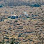 Emergency responders surround the wreckage of an airplane that crashed into a field along U.S. 2 just east of Snohomish on Friday, Nov. 18, 2022, in Snohomish, Washington. (Ryan Berry / The Herald)