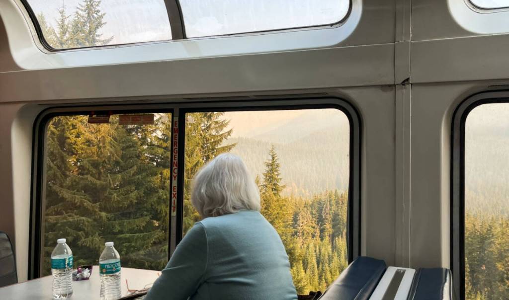 Back in the observation car checking out the views near Blue River, Oregon. (Julia Carmel/Los Angeles Times/TNS)