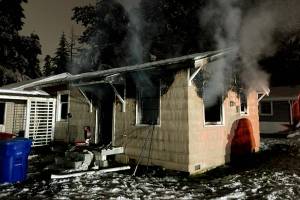 A woman was seriously injured in a house fire Tuesday night in Lynnwood. (South County Fire)