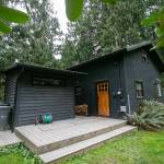 Cabin 3 faces the road at Canyon Creek Cabins on Sep. 23, in Granite Falls. (Ryan Berry / The Herald)