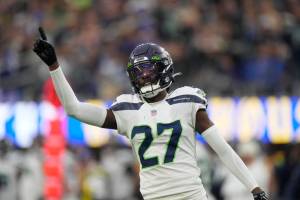 Seattle Seahawks cornerback Tariq Woolen celebrates breaking up a pass during the second half of an NFL football game against the Los Angeles Rams Sunday, Dec. 4, 2022, in Inglewood, Calif. (AP Photo/Mark J. Terrill)