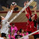 Monroe’s Jessi Mahler sets the ball over the net during the match against Snohomish on Tuesday, Sept. 27, 2022 in Snohomish, Washington. (Olivia Vanni / The Herald)
