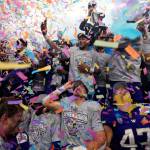 Washington players celebrate their win over Texas in the Alamo Bowl NCAA college football game in San Antonio, Thursday, Dec. 29, 2022. (AP Photo/Eric Gay)