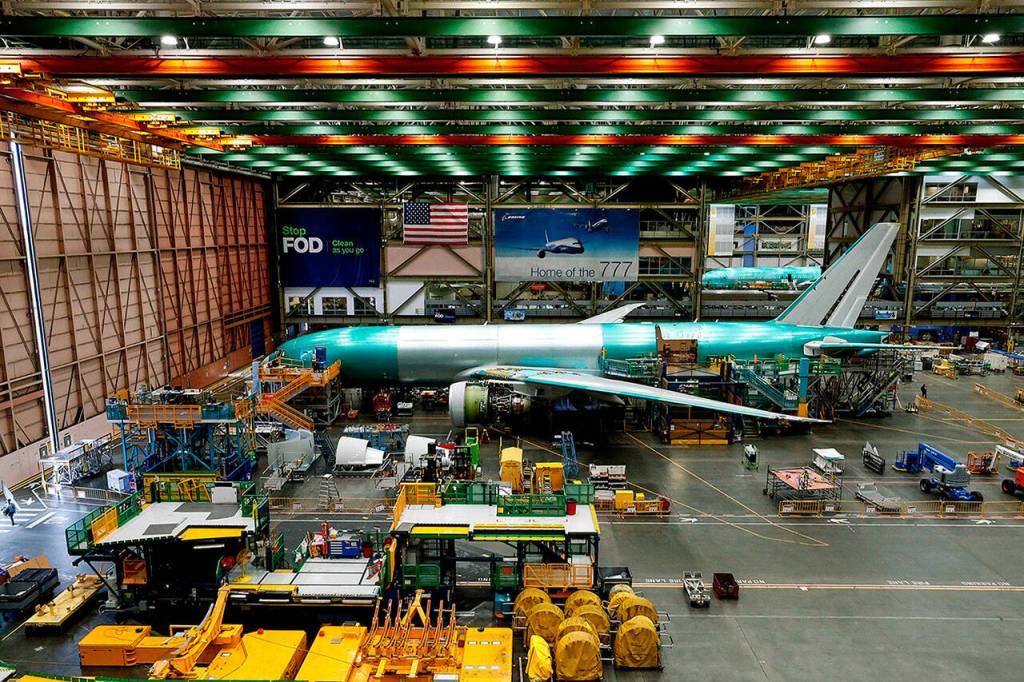 A Boeing 777 freighter is seen in final assembly at Boeings Everett Production Facility on June 15, 2022 in Everett. (Jennifer Buchanan / The Seattle Times via AP, Pool)