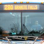 Eric Wilkinson, a Community Transit driver of 17 years, departs from Seaway Transit Center in an empty 280 bus Friday, Nov. 25, 2022, in Everett, Washington. Wilkinson said he usually has about 5 passengers from Boeing on the bus to Granite Falls, but had none Friday because Boeing was closed for the holiday weekend. (Ryan Berry / The Herald)