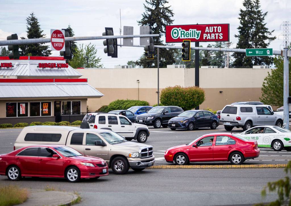 Drivers navigate through traffic at the intersection of Highway 9 and SR-204 on Thursday, June 16, 2022 in Lake Stevens, Washington. (Olivia Vanni / The Herald)