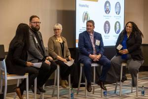 Left to right, EASC Director of Governmental Relations Rashma Agarwal, Sen. Marko Liias, D-Everett, Rep. Carolyn Eslick, R-Sultan, Rep. elect Sam Low, and Rep. Brandy Donaghy, D-Everett talk on a panel during the Economic Alliance Snohomish County 2023 Legislative Kick-off on Thursday, Jan. 5, 2023 at Hotel Indigo in Everett, Washington. (Annie Barker / The Herald)
