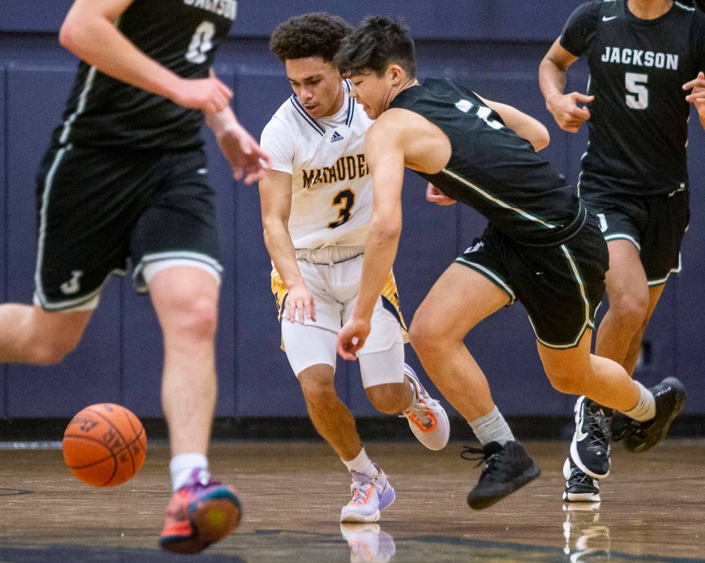 Mariners Macky James steals the ball from Jacksons Harris Kampe during the game on Wednesday in Everett. (Olivia Vanni / The Herald)