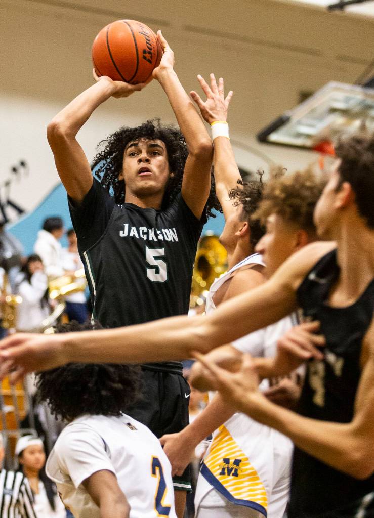 Jacksons Sylas Williams attempts a jump shot during the game against Mariner on Wednesday in Everett. (Olivia Vanni / The Herald)