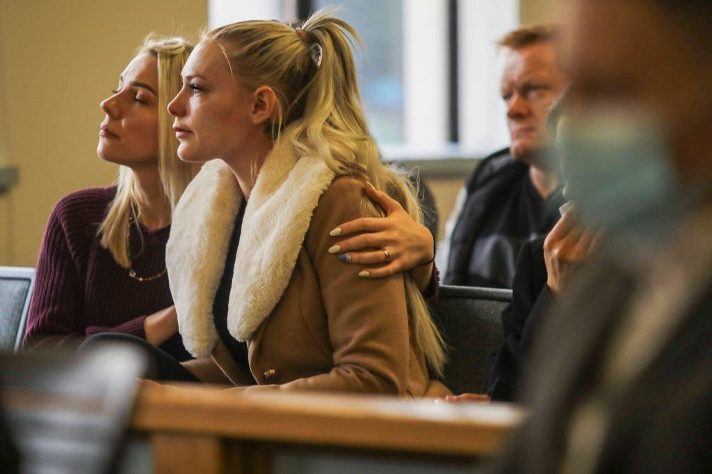 Tallen Cooper, Ilya Hrudzkos fiancée, right, listens during the sentencing of Ilya Hrudzko, who drove into a tree in Stanwood in 2020 and killed his passenger, on Monday at Snohomish County Superior Court in Everett. (Annie Barker / The Herald)
