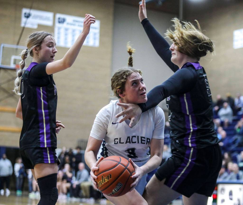 Glacier Peaks Brynna Pukis (3) looks to shoot during a game between the Lake Stevens Vikings and Glacier Peak Grizzlies on Friday in Snohomish. The Grizzlies won 51-32. (Annie Barker / The Herald) (Annie Barker / The Herald)