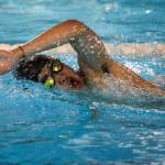 Kamiaks Bryan Zi Wong wins the second heat of the 100 yard backstroke during the Jackson vs. Kamiak boys swim and dive meet at West Coast Aquatics in Mill Creek, Washington on Tuesday Jan. 10, 2023. (Annie Barker / The Herald)