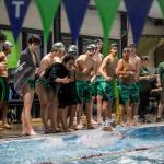 Swimmers cheer during the Jackson vs. Kamiak boys swim and dive meet at West Coast Aquatics in Mill Creek, Washington on Tuesday Jan. 10, 2023. (Annie Barker / The Herald)