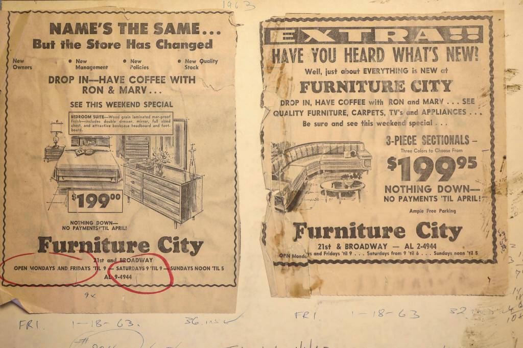 Furniture ads from 1963 are displayed at Behars Furniture on Monday. Behars Furniture on Broadway in Everett is closing up shop after 60 years in business. The family-owned furniture store opened in 1963, when mid-century model styles were all the rage. Second-generation owner, Jay Behar says its time to move on. (Annie Barker / The Herald)