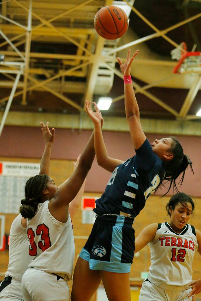Meadowdales Samantha Medina hits a tough spinning shot against Mountlake Terrace on Wednesday, Jan.11, 2023, at Mountlake Terrace High School in Mountlake Terrace, Washington. (Ryan Berry / The Herald)