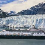 A cruise ships sails past an Alaskan glacier. Most big ship cruises follow a similar routing, with most calling at Ketchikan, Juneau and Skagway at a minimum -- but that's where the similarities end. (Russ Heinl / Dreamstime via TNS)