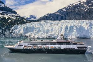 A cruise ships sails past an Alaskan glacier. Most big ship cruises follow a similar routing, with most calling at Ketchikan, Juneau and Skagway at a minimum -- but that's where the similarities end. (Russ Heinl / Dreamstime via TNS)