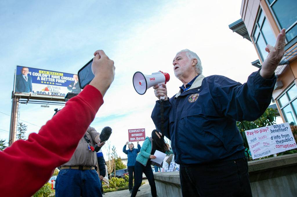 Lynnwood City Council Vice President Jim Smith speaks against the location of a new methadone clinic during a protest on Saturday, Jan. 14, 2023, in Lynnwood, Washington. (Ryan Berry / The Herald)