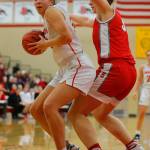 Snohomishs Tyler Gildersleeve-Stiles tries to work her way into the paint against Stanwood on Friday, Jan. 13, 2023, at Snohomish High School in Snohomish, Washington. (Ryan Berry / The Herald)