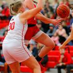 Stanwoods Ellalee Wortham tries for a driving layup against Snohomish on Friday, Jan. 13, 2023, at Snohomish High School in Snohomish, Washington. (Ryan Berry / The Herald)