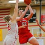 Stanwoods Vivienne Berrett scores a basket against Snohomish on Friday, Jan. 13, 2023, at Snohomish High School in Snohomish, Washington. (Ryan Berry / The Herald)