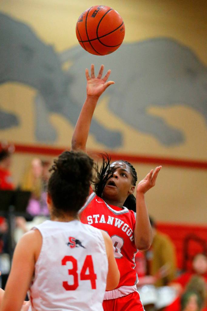Stanwoods Chloe Santeford shoots from close range against Snohomish on Friday, Jan. 13, 2023, at Snohomish High School in Snohomish, Washington. (Ryan Berry / The Herald)