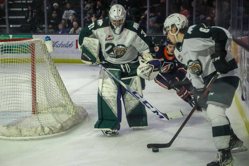 Silvertips Tyler Palmer (31) and Ty Gibson (6) defend the goal during a game between the Silvertips and Kamloops Blazers at the Angel of the Winds Arena on Friday, Jan. 13, 2023. The Silvertips fell to the Kamloops, 3-6. (Annie Barker / The Herald)