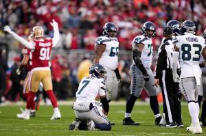 Seattle Seahawks quarterback Geno Smith (7) reacts after losing a fumble against the San Francisco 49ers during the second half of Saturdays NFL wild-card playoff football game in Santa Clara, Calif. (AP Photo/Godofredo A. Vásquez)