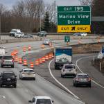 Orange traffic barrels direct drivers away from a section of I-5 that recently buckled causing major traffic backups along the interstate on Tuesday, Jan. 17, 2023 in Everett, Washington. (Olivia Vanni / The Herald)