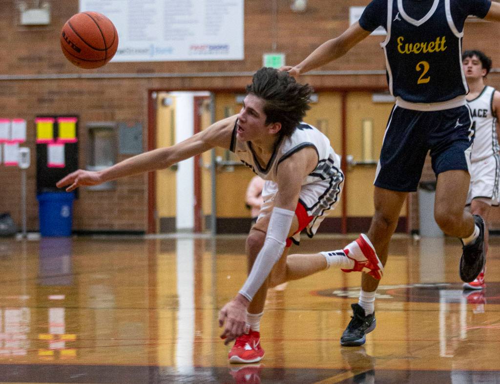 Mountlake Terraces Jaxon Dubiel get tripped during a breakaway during the game against Everett on Tuesday, Jan. 17, 2023 in Mountlake Terrace, Washington. (Olivia Vanni / The Herald)