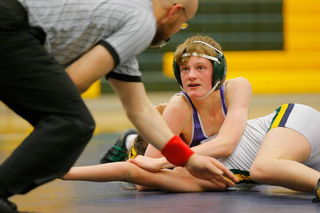 Edmonds-Woodways Dylan Rice looks for the ref to call it while wrestling against Shorecrests Micah Fergerson on Wednesday, Jan. 18, 2023, at Shorecrest High School in Shoreline, Washington. (Ryan Berry / The Herald)