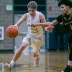 Arlingtons Leyton Martin drives to the hoop during the game against Shorecrest on Thursday, Jan. 19, 2023 in Arlington, Washington. (Olivia Vanni / The Herald)
