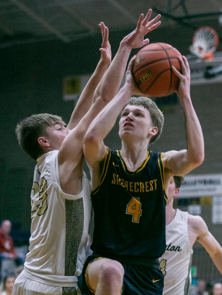 Arlingtons Anthony Najera attempts a layup during the game against Arlington on Thursday, Jan. 19, 2023 in Arlington, Washington. (Olivia Vanni / The Herald)