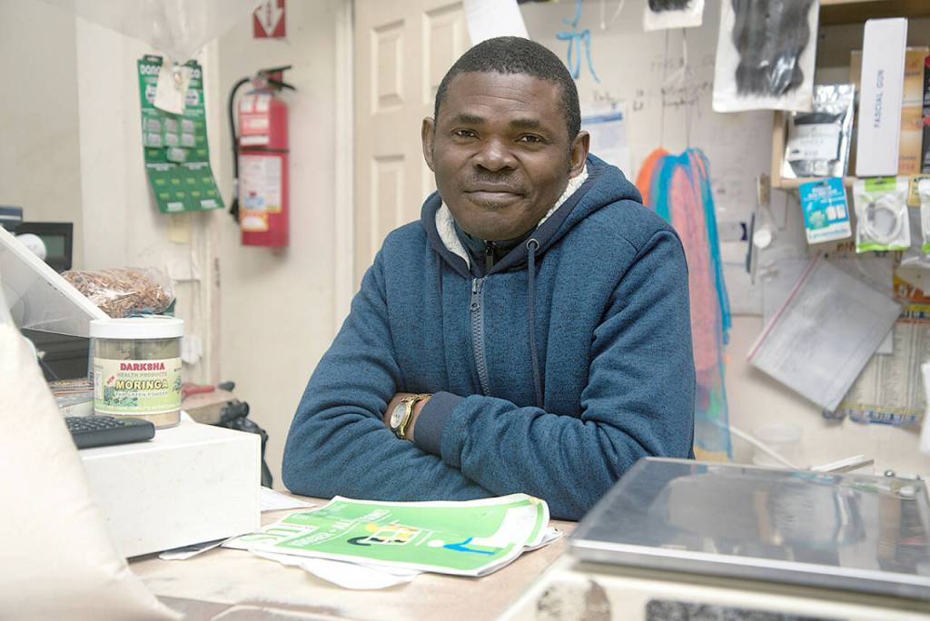 Moses Ufomba is the owner of Royal African and Caribbean Foods in the Bronx, New York. (Mitch Dao / YES! Media)