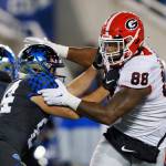 Georgia defensive lineman Jalen Carter (88) rushes the passes during a game against Kentucky on Nov. 19, 2022, in Lexington, Ky. (AP Photo/Michael Clubb)