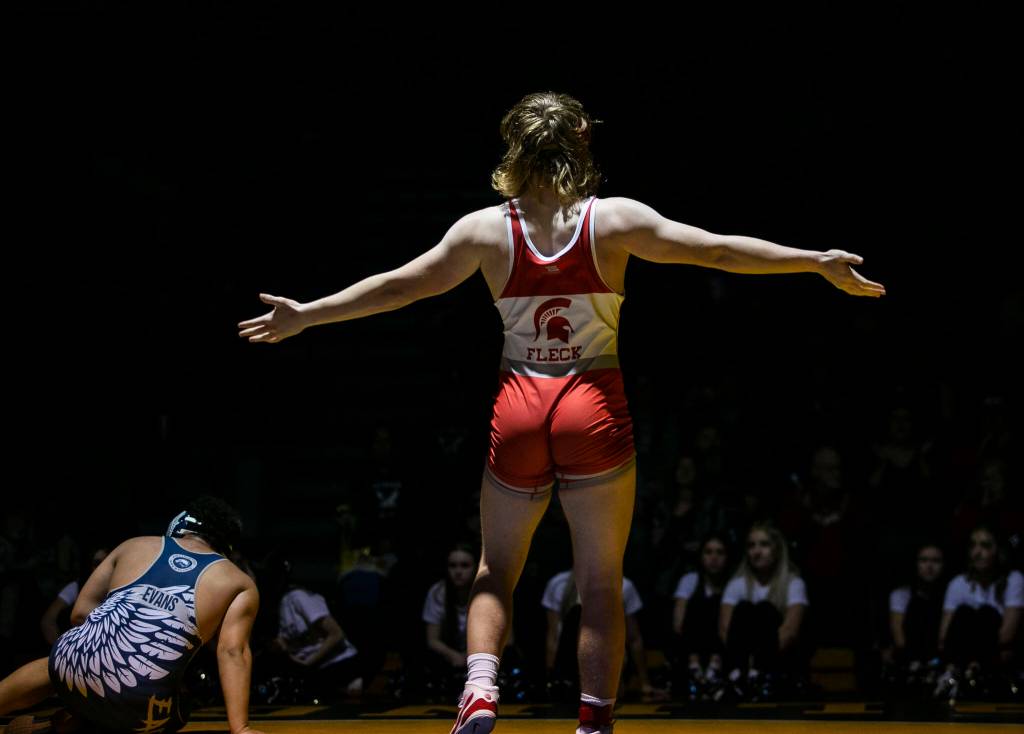 Arlingtons Elijah Fleck reacts to beating Arlingtons Isaiah Evans in the 220 pound weight class match on Tuesday, Jan. 24, 2023 in Arlington, Washington. (Olivia Vanni / The Herald)