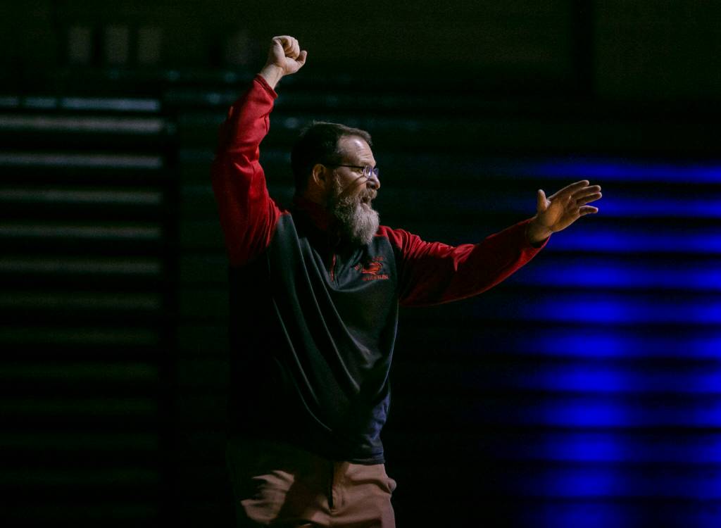 Stanwoods head coach Ray Mather yells out instructions during the match against Arlington on Tuesday, Jan. 24, 2023 in Arlington, Washington. (Olivia Vanni / The Herald)