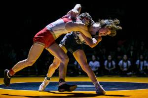 126 Arlington’s Beau Gudde and Stanwood’s Bryan Roodzant during the match on Tuesday, Jan. 24, 2023 in Arlington, Washington. (Olivia Vanni / The Herald)