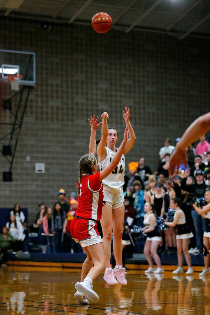Arlingtons Jenna Villa puts up a three against Stanwood on Wednesday, Jan. 25, 2023, at Arlington High School in Arlington, Washington. (Ryan Berry / The Herald)