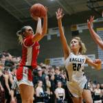 Stanwoods Tatum Brager shoots from the corner against Arlington on Wednesday, Jan. 25, 2023, at Arlington High School in Arlington, Washington. (Ryan Berry / The Herald)