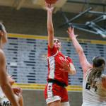 Stanwoods Tatum Brager tries a floater from medium range against Arlington on Wednesday, Jan. 25, 2023, at Arlington High School in Arlington, Washington. (Ryan Berry / The Herald)
